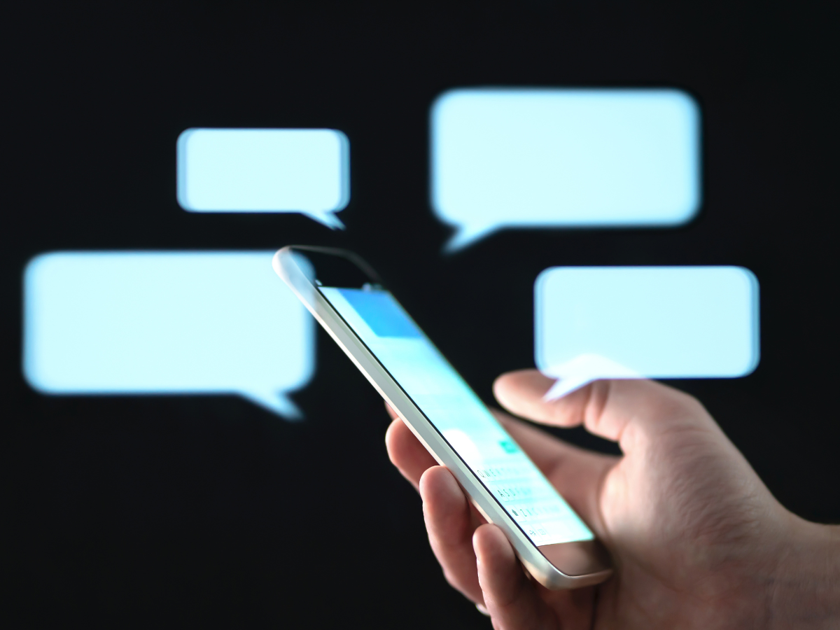 person texting on phone