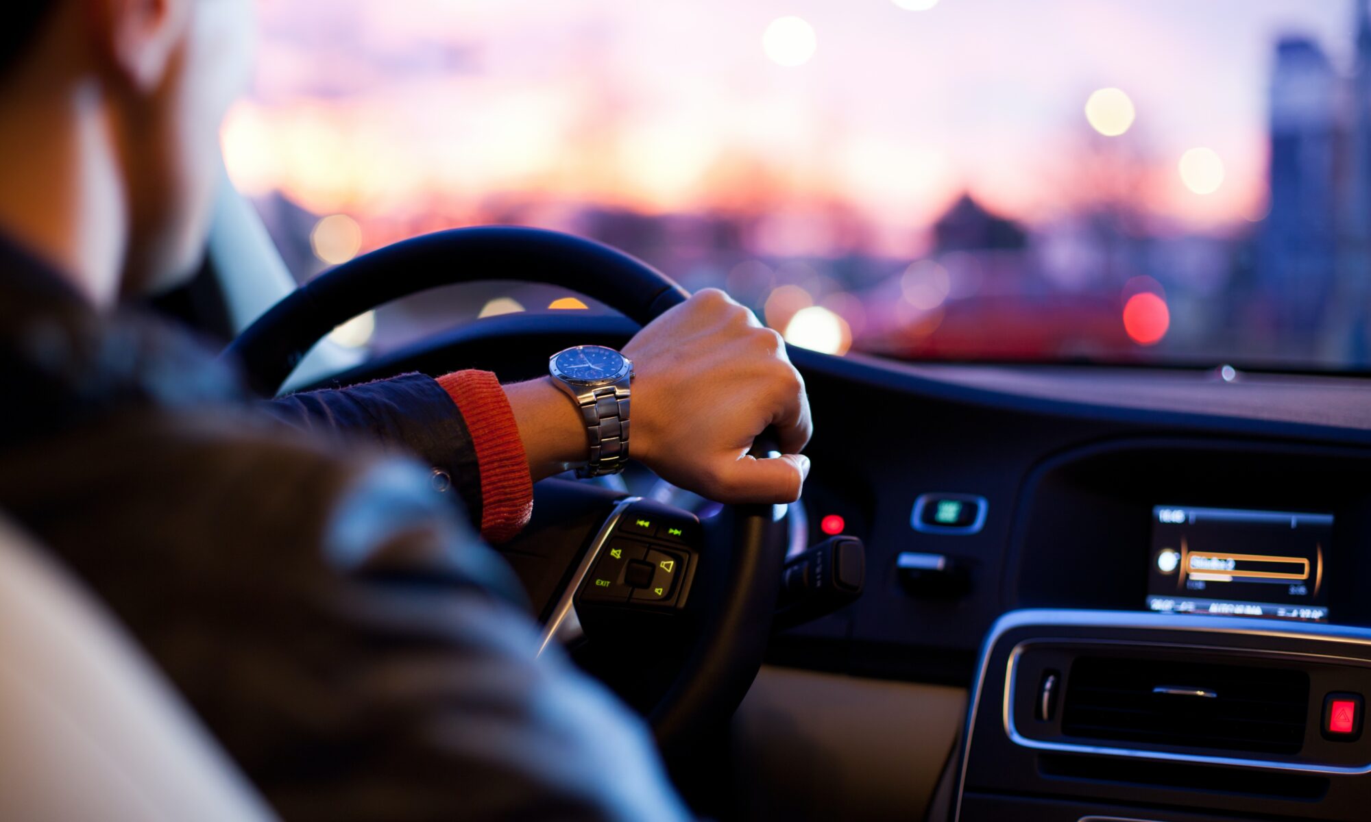 man driving at night