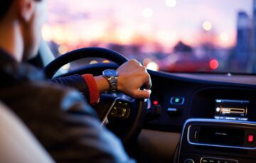 man driving at night