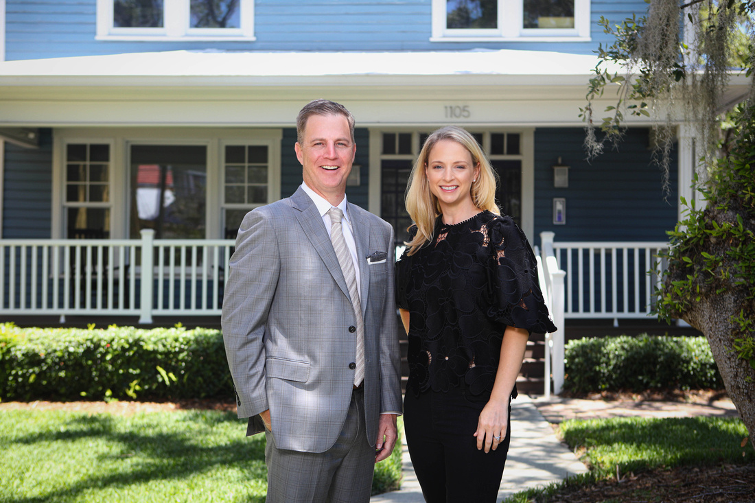 ben and amy outside of a home criminal defense attorneys in tampa