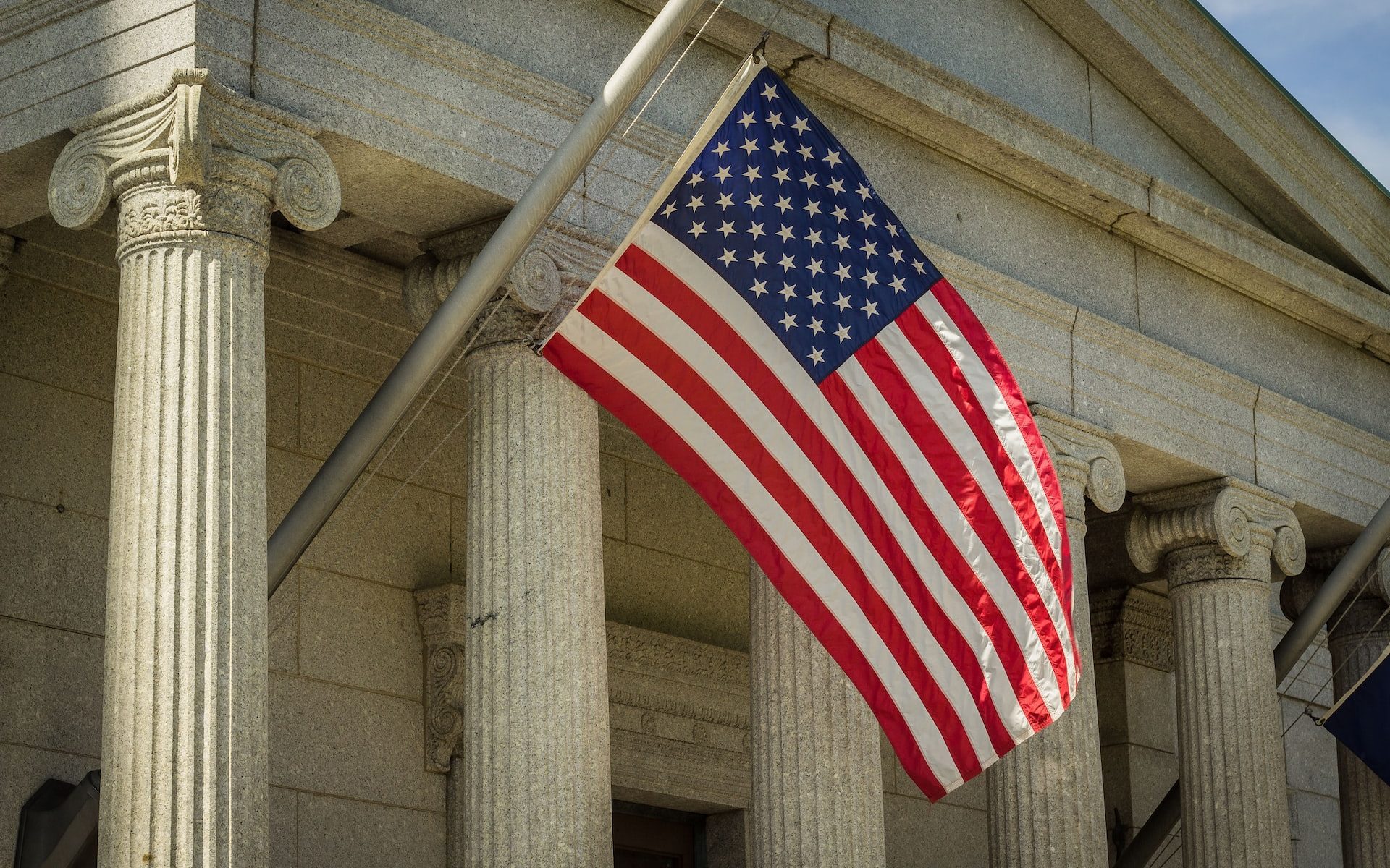 Courthouse with American Flag in Front