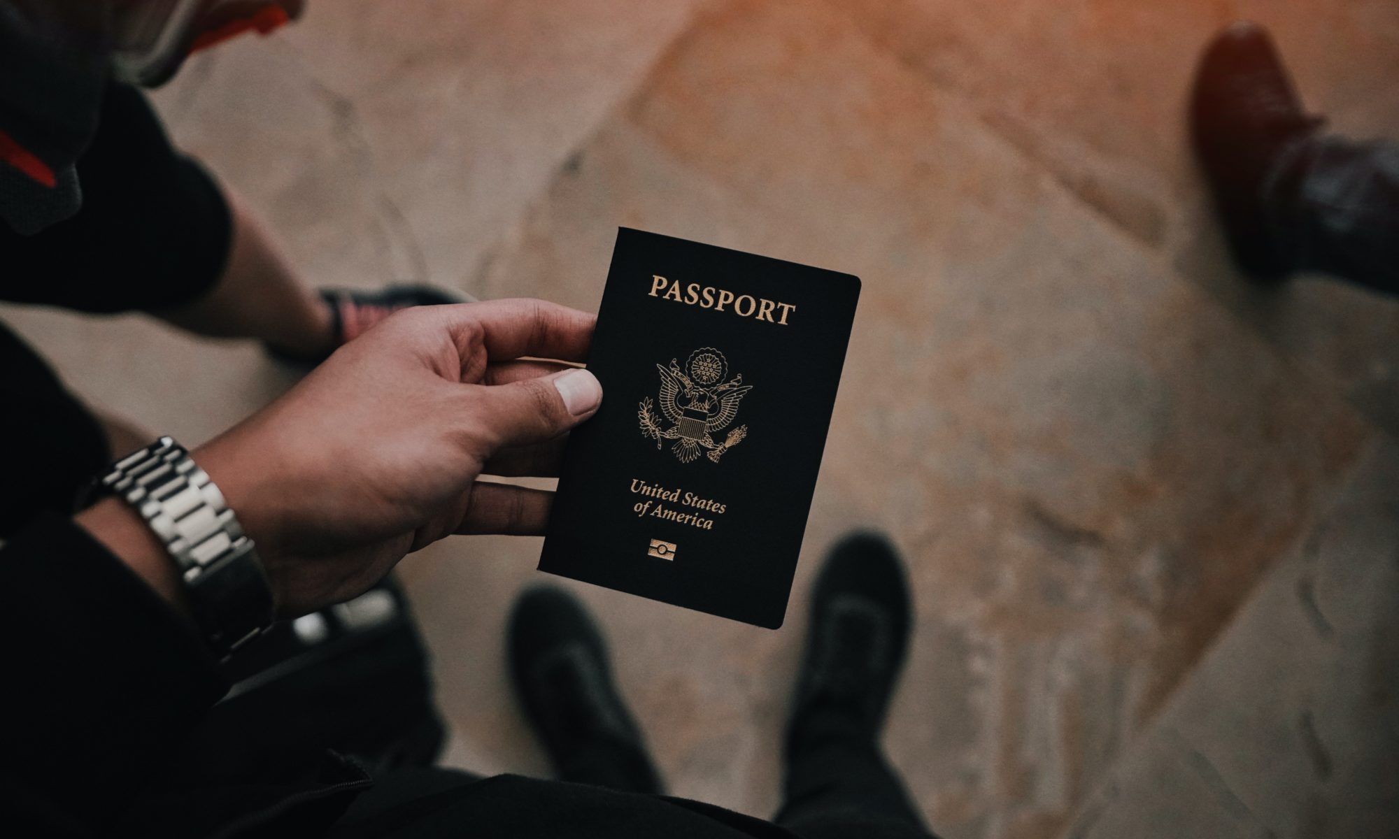 Passport In Person's Hand