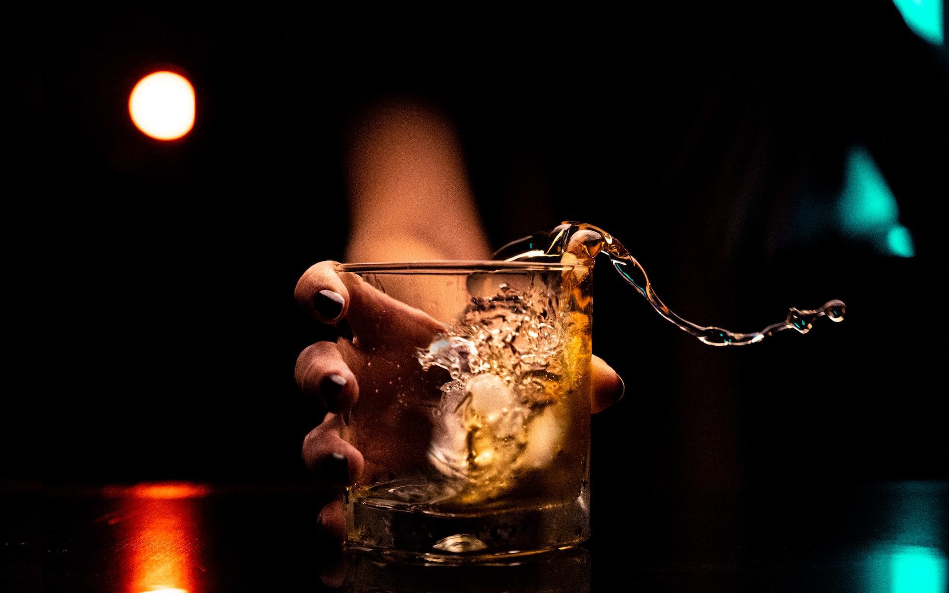 brown alcoholic liquid in glass