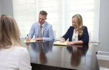 Ben Stechschulte and Amy Nell in meeting with client