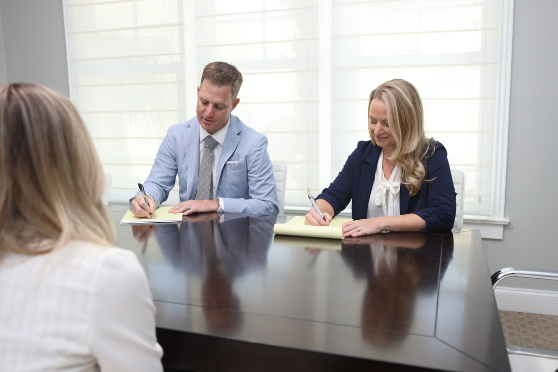 Ben Stechschulte and Amy Nell in meeting with client