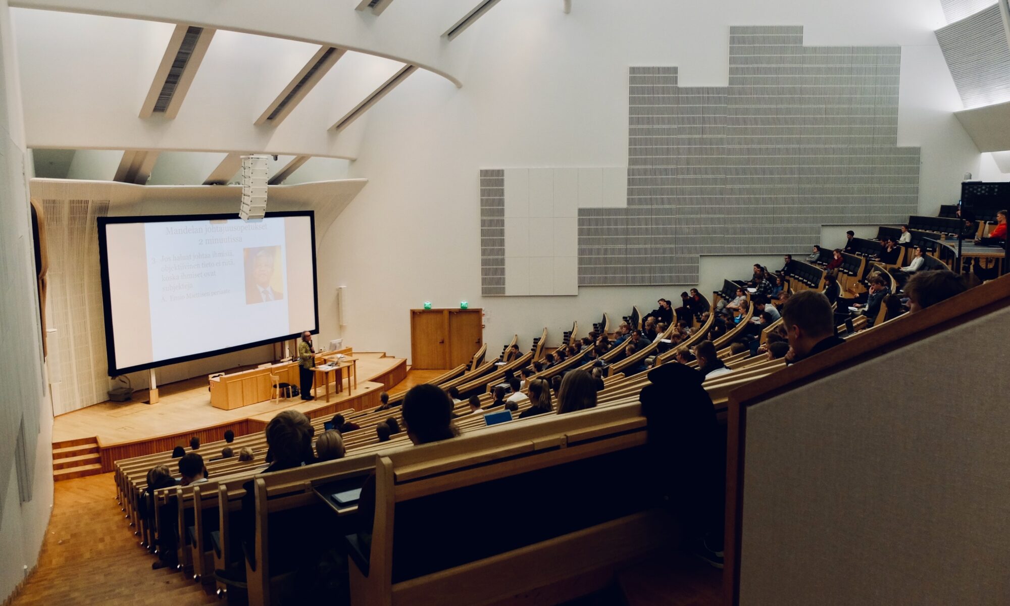 students sitting in college classroom