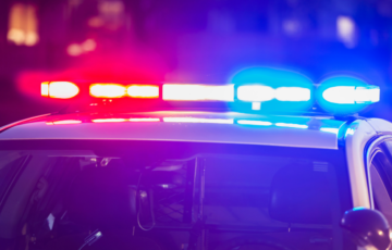 blue and red police lights at DUI traffic stop