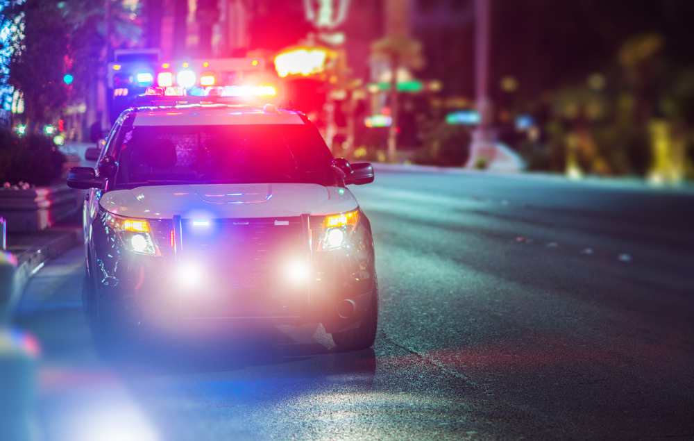 police lights at night on SUV