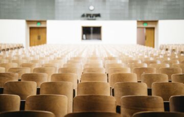 empty chairs in college classroom