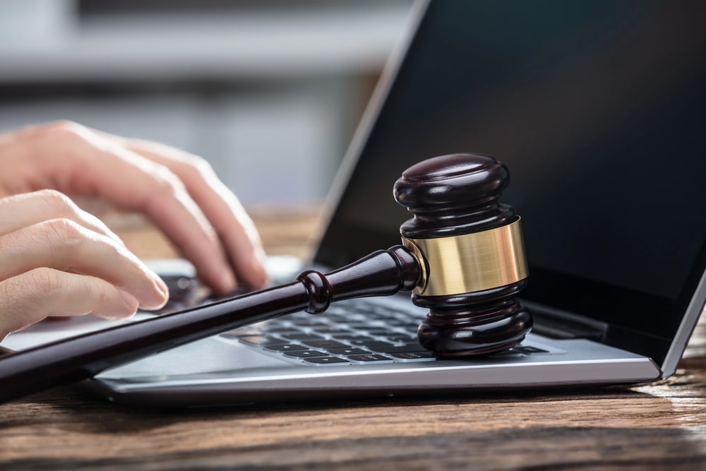 Attorney reviewing cryptocurrency legal documents